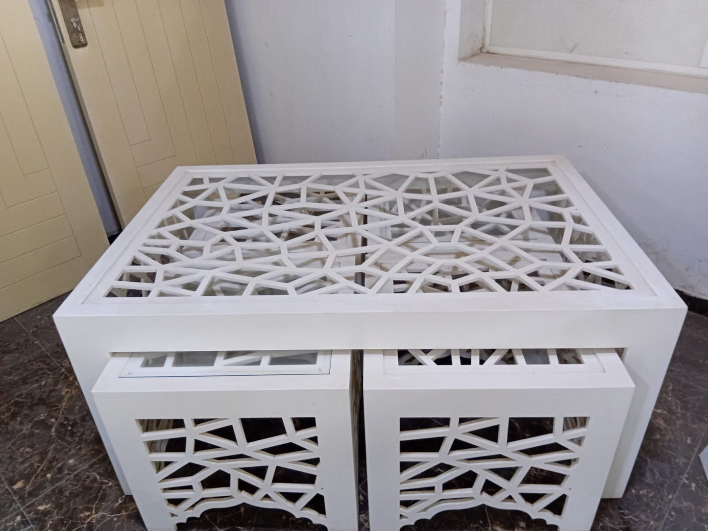 Laser Cut white MDF table and side chair including top layer glass by Supplytent.com