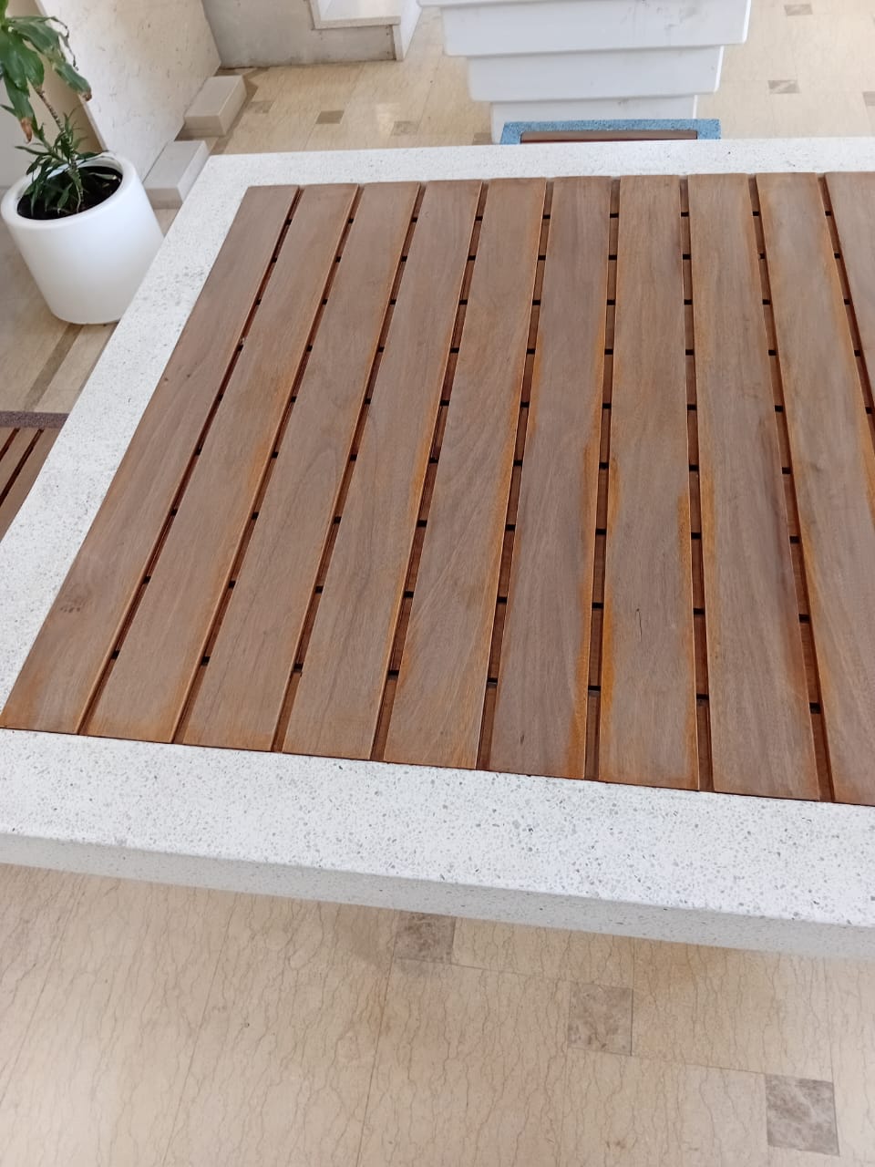 white Terrazzo table + 4 seats different colors by Supplytent.com